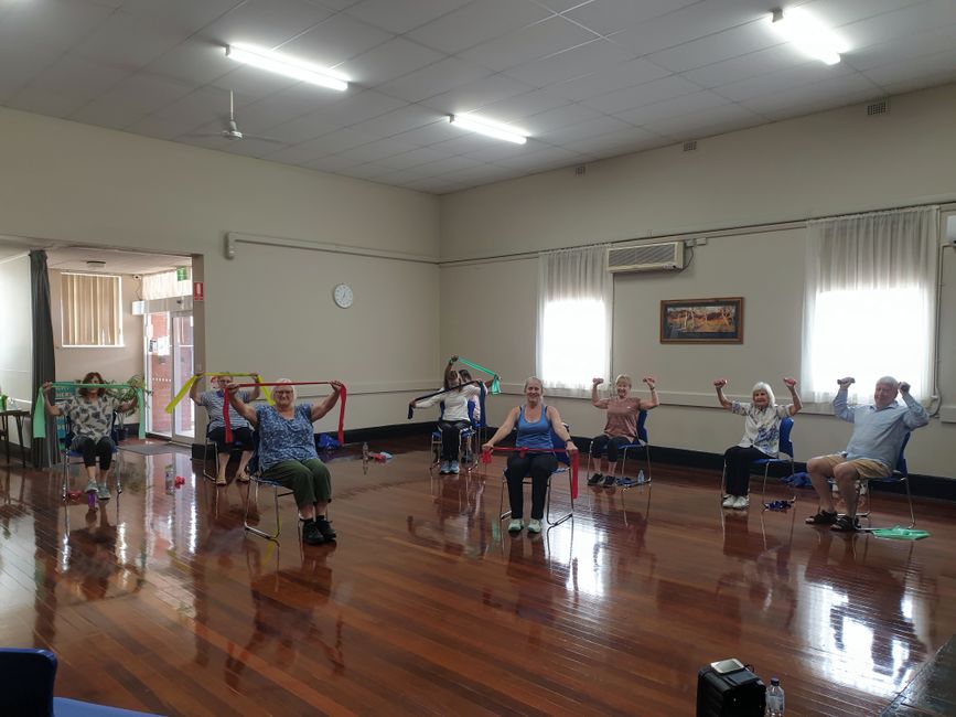 Standing balance exercises seniors can do holding a chair